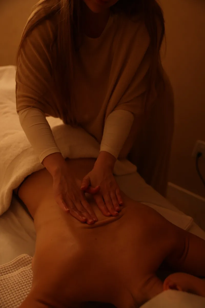 Elizaveta performing a hands-on abdominal massage